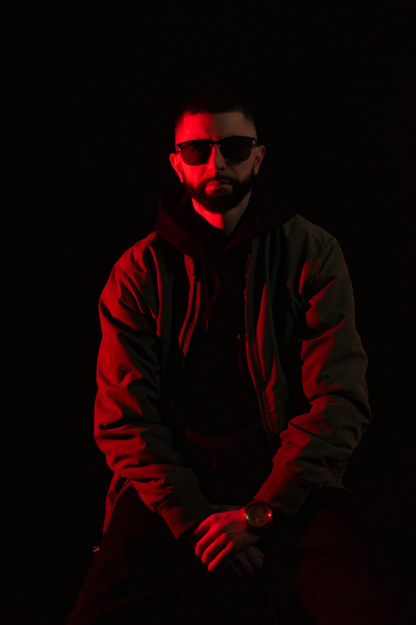 RESON in red studio lighting